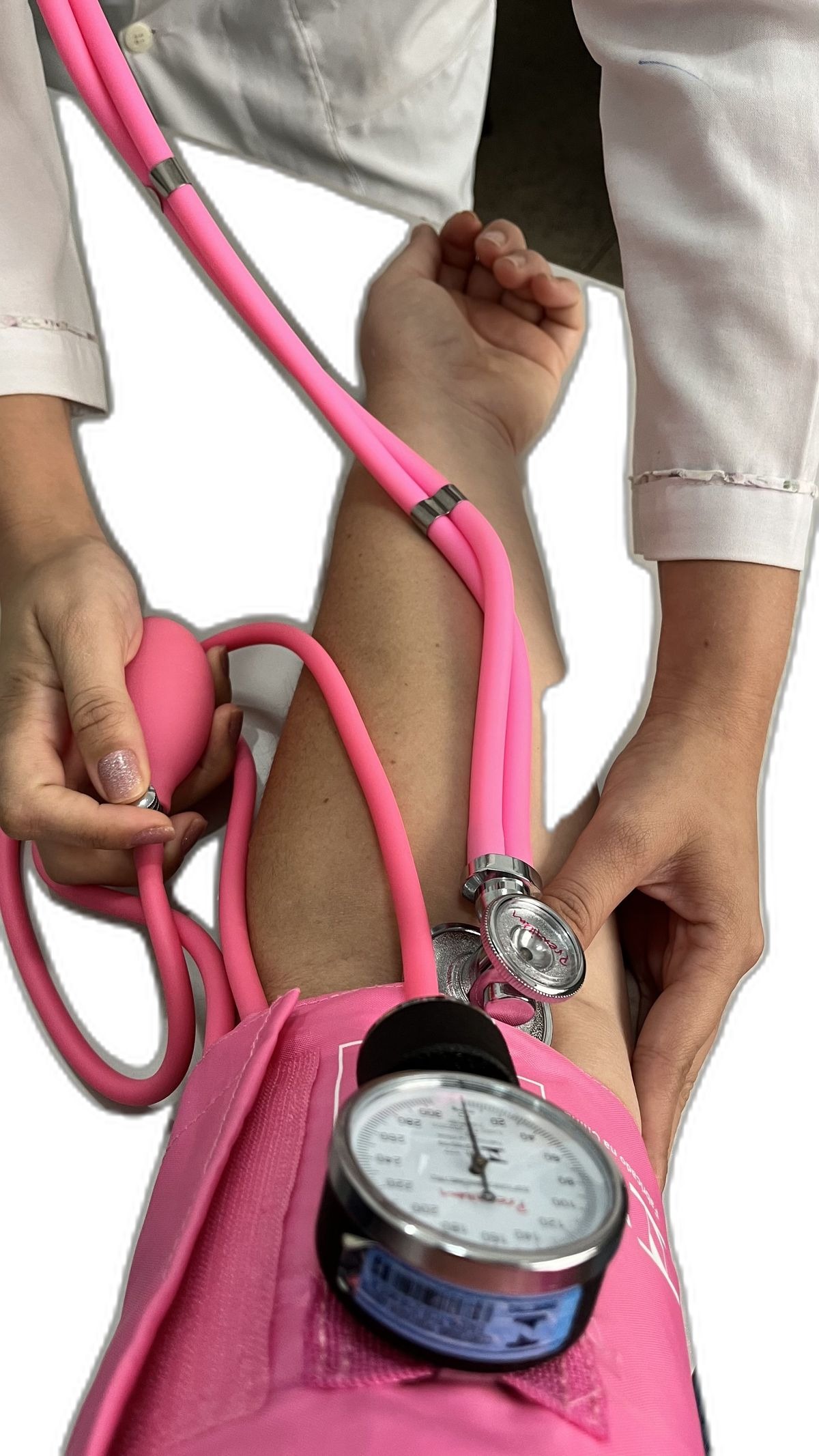 Pink stethoscope and BP kit in use